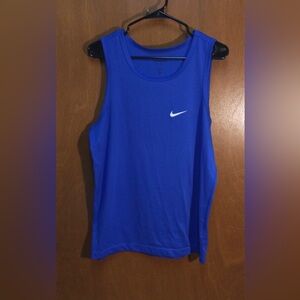 The Nike Tee Tank Shirt Medium Adult Blue Dri-Fit Swoosh Sleeveless Gym Mens